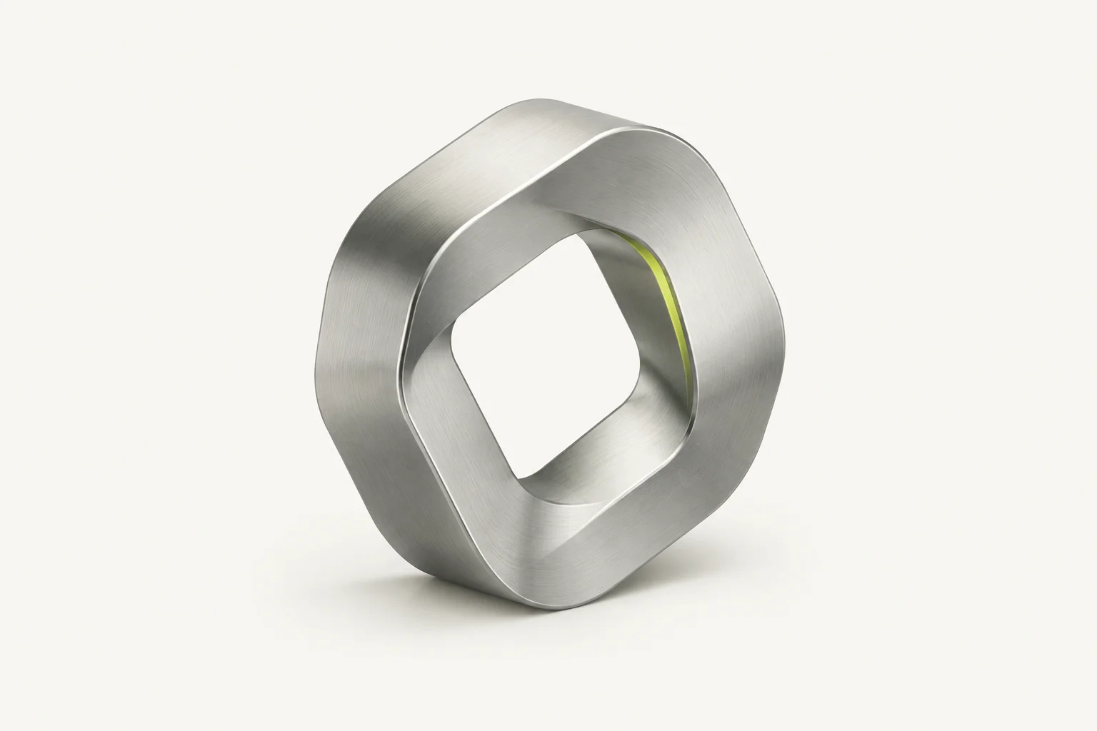 Odyssy’s sculptural orbital mark, formed from two precision metal ribbons